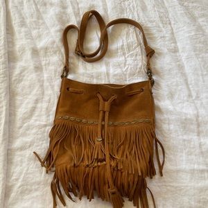 Lucky Brand tassle purse. In great condition, like new.